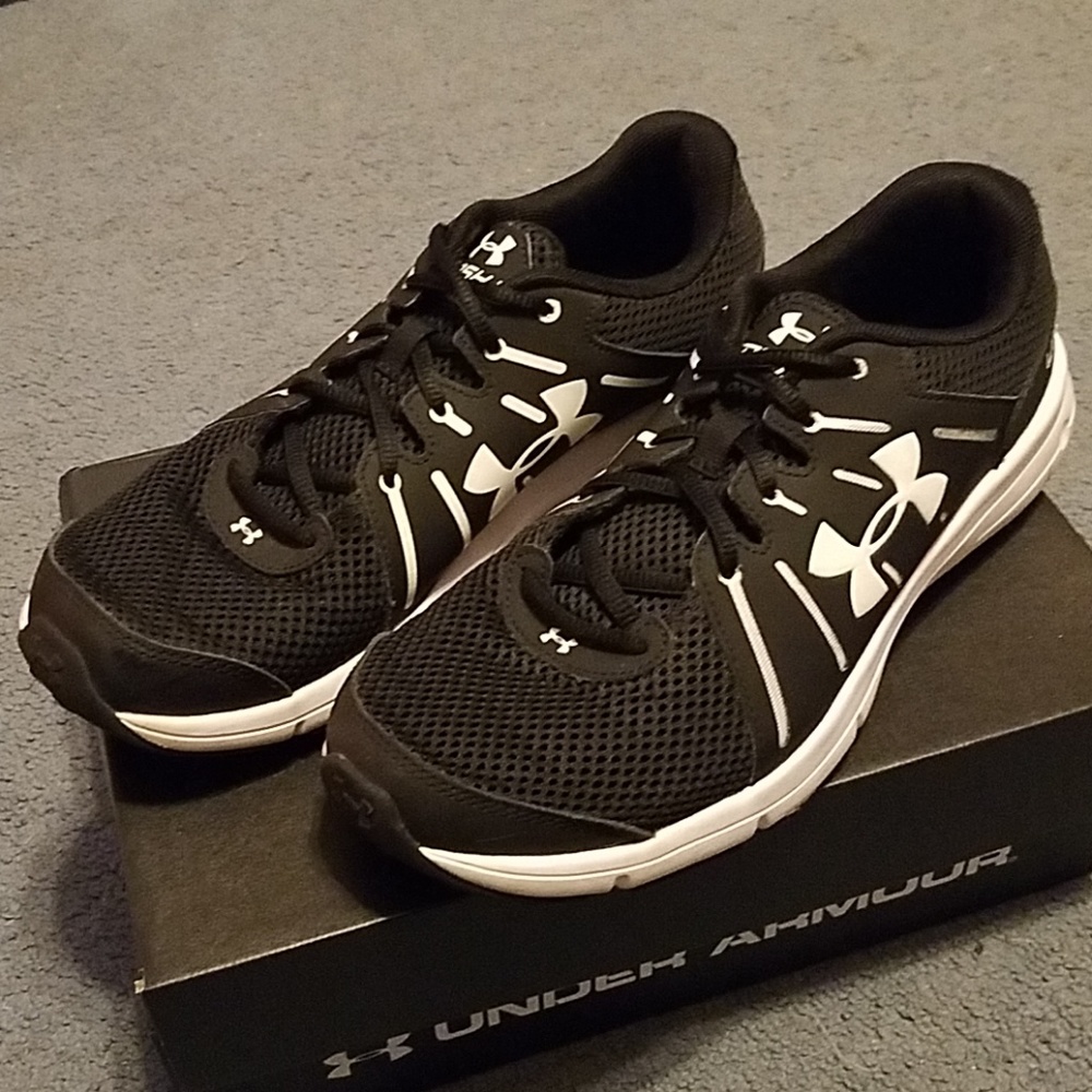 Black and White sneakers, lightly worn